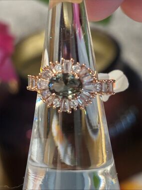 Rose Gold Ring with Green Oval Center and Halo Accents